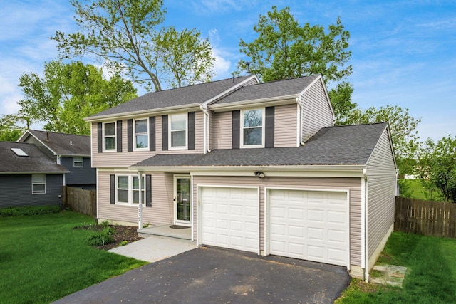 1279 Reana Dr, Galloway, OH 43119 - view of front of property with driveway, an attached garage, and roof with shingles