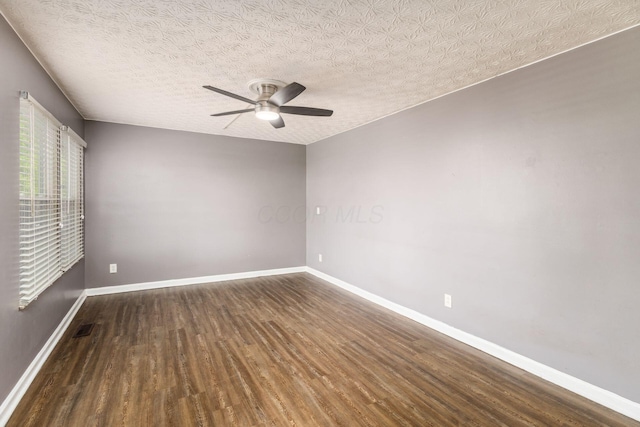 1279 Reana Dr, Galloway, OH 43119 - spare room featuring wood finished floors, a ceiling fan, baseboards, and a textured ceiling