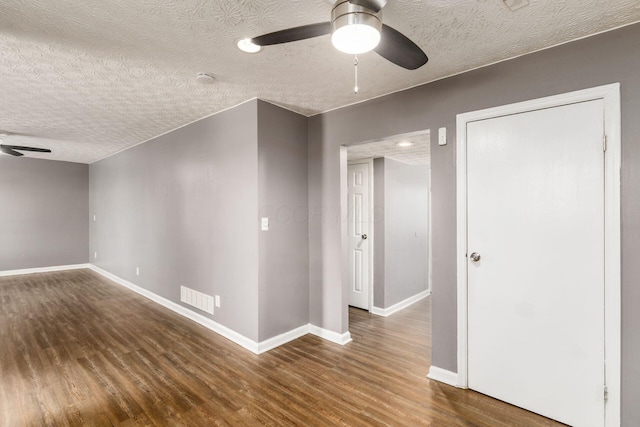 1279 Reana Dr, Galloway, OH 43119 - spare room featuring a ceiling fan, wood finished floors, baseboards, and a textured ceiling
