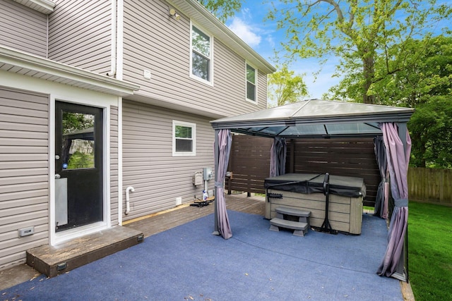 1279 Reana Dr, Galloway, OH 43119 - view of patio featuring a hot tub, a gazebo, and fence