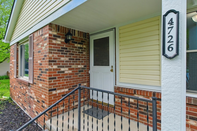 4726 Wendler Blvd, Columbus, OH 43230 - doorway to property featuring brick siding