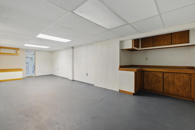 4726 Wendler Blvd, Columbus, OH 43230 - basement featuring a paneled ceiling and baseboards
