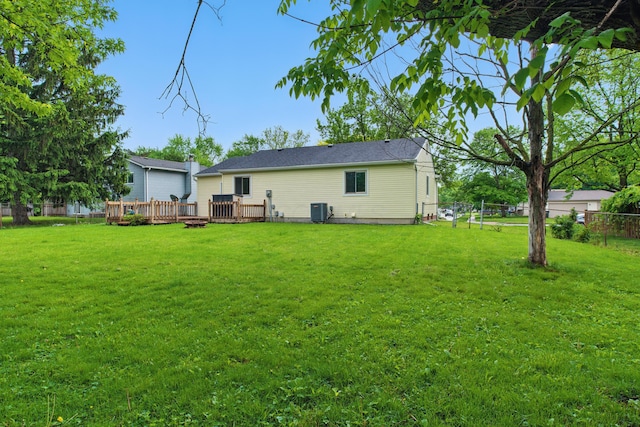 4726 Wendler Blvd, Columbus, OH 43230 - rear view of house featuring a wooden deck and central air condition unit