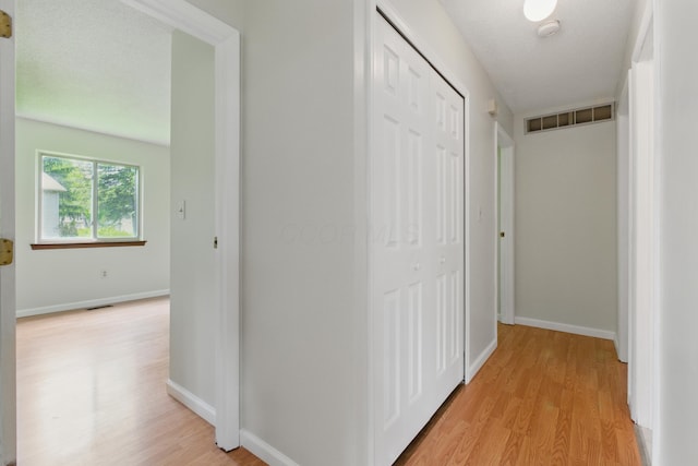 4726 Wendler Blvd, Columbus, OH 43230 - hallway featuring light wood-type flooring and baseboards