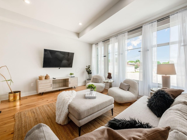 201 E 5th Ave, Columbus, OH 43201 - living room featuring light wood finished floors, baseboards, and recessed lighting
