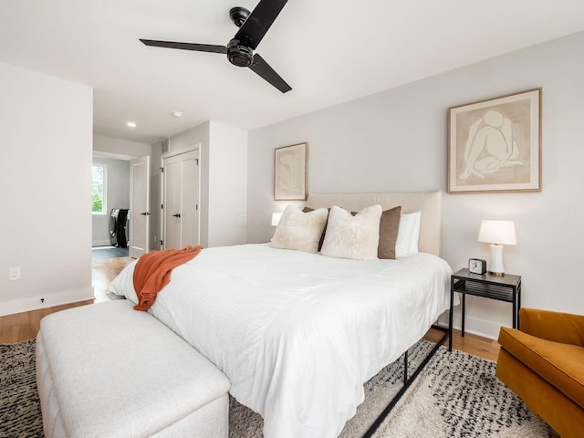 201 E 5th Ave, Columbus, OH 43201 - bedroom featuring light wood-type flooring, baseboards, a ceiling fan, and recessed lighting