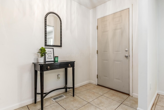 717 Birmingham Rd, Westerville, OH 43081 - foyer entrance with light tile patterned floors and baseboards