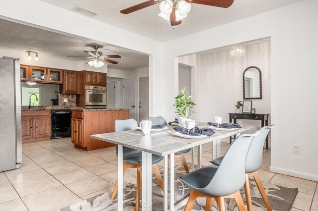 717 Birmingham Rd, Westerville, OH 43081 - dining room with light tile patterned floors and ceiling fan