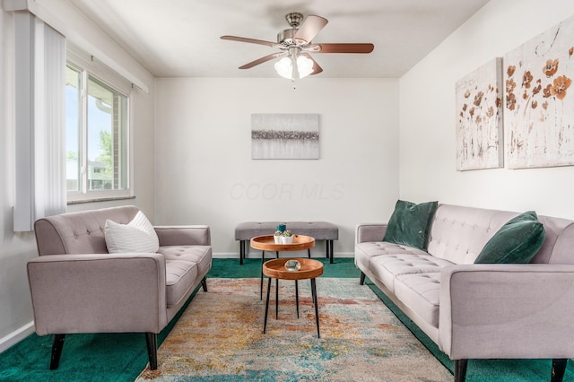 717 Birmingham Rd, Westerville, OH 43081 - living room with carpet floors, ceiling fan, and baseboards