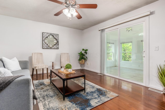 717 Birmingham Rd, Westerville, OH 43081 - living area featuring wood finished floors, a ceiling fan, and baseboards