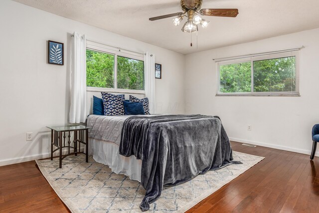 717 Birmingham Rd, Westerville, OH 43081 - bedroom featuring baseboards, wood finished floors, and ceiling fan