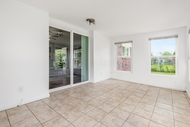 717 Birmingham Rd, Westerville, OH 43081 - unfurnished room with light tile patterned floors and baseboards
