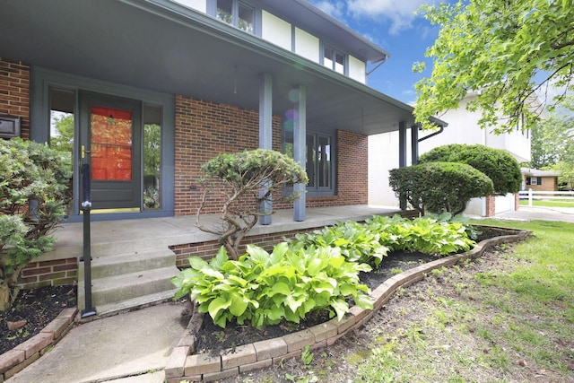 1883 Fairhaven Rd, Columbus, OH 43229 - entrance to property featuring covered porch and brick siding