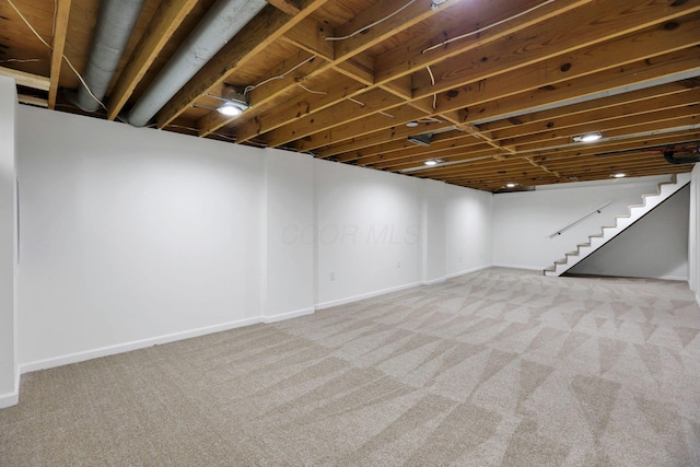 1883 Fairhaven Rd, Columbus, OH 43229 - finished below grade area featuring carpet, baseboards, and stairs
