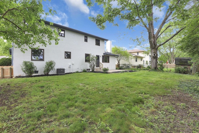 1883 Fairhaven Rd, Columbus, OH 43229 - back of property with central AC and a patio area