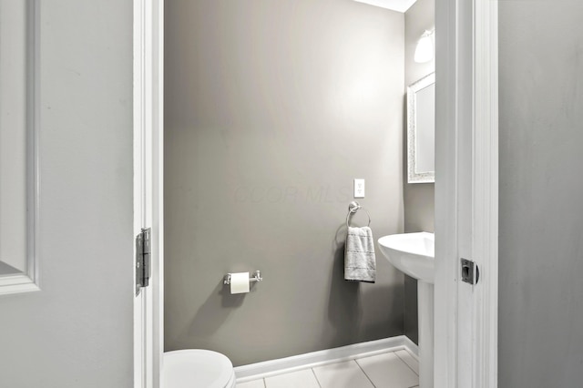 4008 Ryleland Ct, Powell, OH 43065 - half bathroom with baseboards, toilet, and tile patterned floors