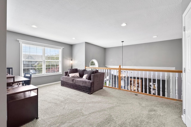 4008 Ryleland Ct, Powell, OH 43065 - living area with carpet flooring, recessed lighting, baseboards, and a textured ceiling