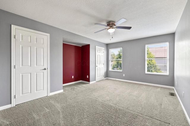 4008 Ryleland Ct, Powell, OH 43065 - unfurnished bedroom with carpet flooring, baseboards, a textured ceiling, and a ceiling fan