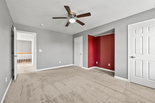 4008 Ryleland Ct, Powell, OH 43065 - unfurnished bedroom with carpet floors, baseboards, a ceiling fan, and a textured ceiling