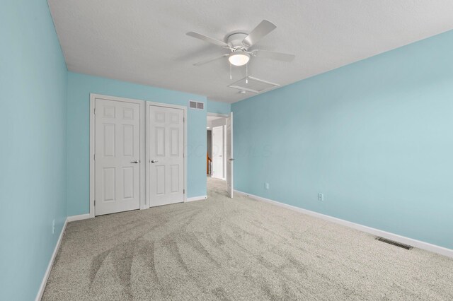 4008 Ryleland Ct, Powell, OH 43065 - unfurnished bedroom with carpet floors, baseboards, a textured ceiling, and a ceiling fan