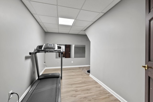 4008 Ryleland Ct, Powell, OH 43065 - workout room featuring light wood-type flooring, a drop ceiling, and baseboards
