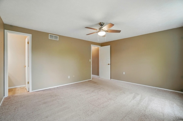 662 Pamlico St Unit Z7, Columbus, OH 43228 - spare room with a ceiling fan, light colored carpet, and baseboards