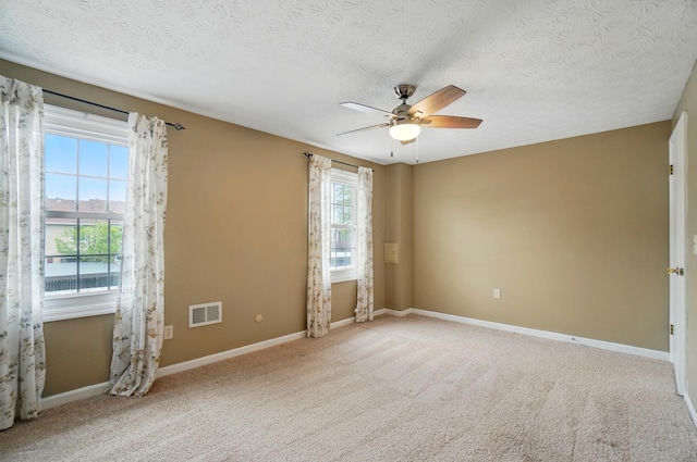 662 Pamlico St Unit Z7, Columbus, OH 43228 - carpeted spare room featuring ceiling fan, baseboards, and a textured ceiling