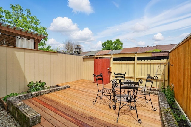 662 Pamlico St Unit Z7, Columbus, OH 43228 - wooden deck featuring outdoor dining space