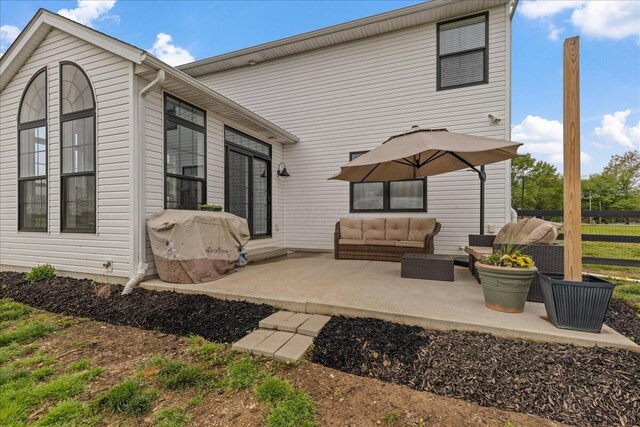 2460 N Court St, Circleville, OH 43113 - back of house with a patio and an outdoor living space