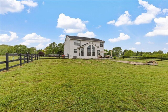 2460 N Court St, Circleville, OH 43113 - rear view of house with central air condition unit and a rural view