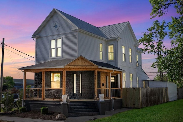 448 Reynolds Ave, Columbus, OH 43201 - view of front of house featuring covered porch and metal roof