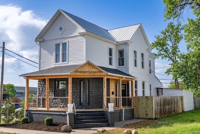 448 Reynolds Ave, Columbus, OH 43201 - view of front of house featuring a porch and metal roof