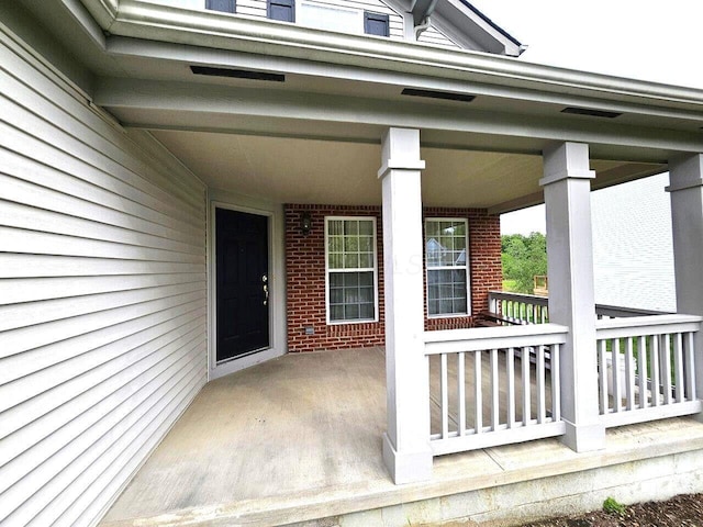 464 Highbanks Valley Dr, Newark, OH 43055 - entrance to property with brick siding and a porch