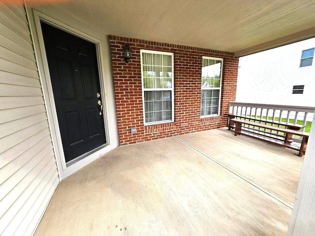 464 Highbanks Valley Dr, Newark, OH 43055 - entrance to property with brick siding and covered porch