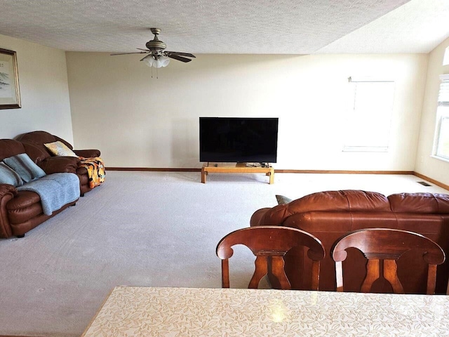 464 Highbanks Valley Dr, Newark, OH 43055 - living area with baseboards, carpet floors, a ceiling fan, and a textured ceiling