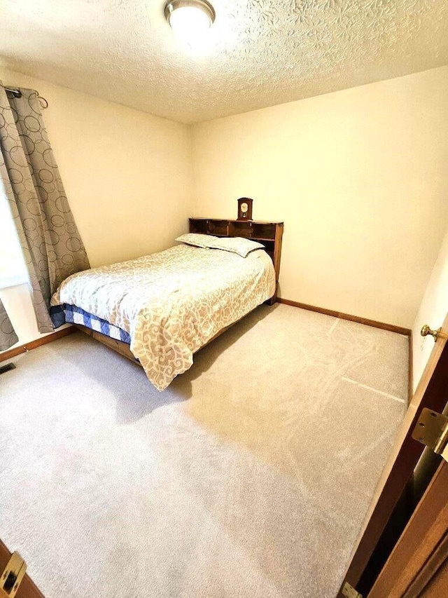 464 Highbanks Valley Dr, Newark, OH 43055 - bedroom with carpet floors, baseboards, and a textured ceiling