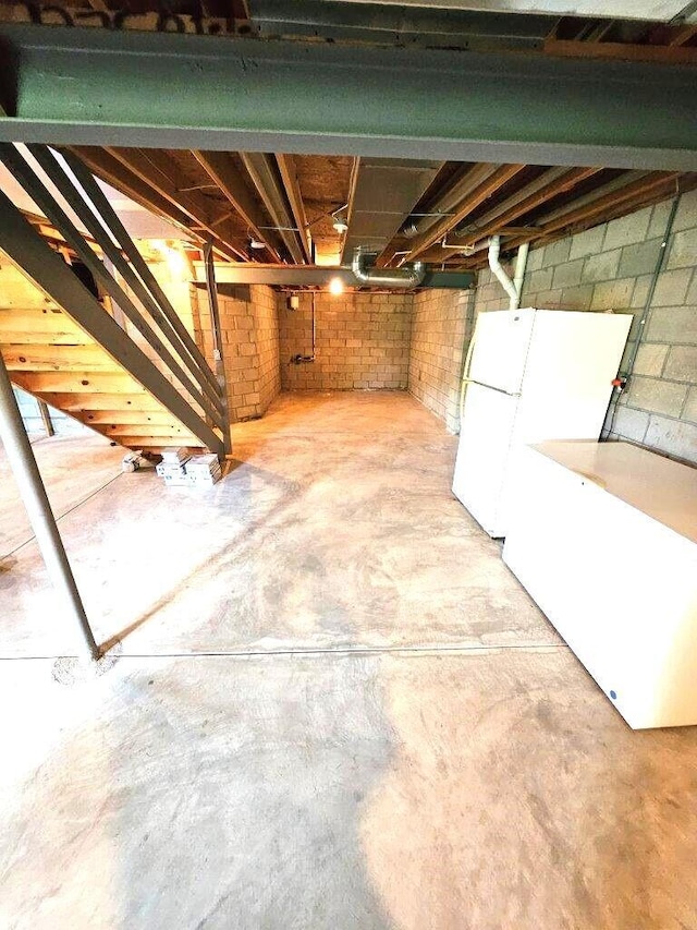 464 Highbanks Valley Dr, Newark, OH 43055 - unfinished basement with freestanding refrigerator