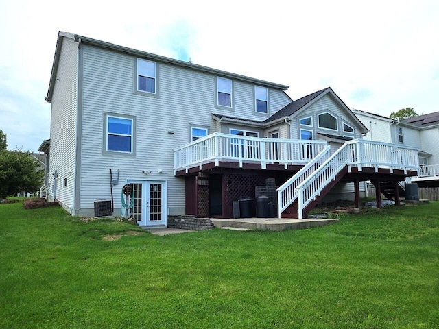 464 Highbanks Valley Dr, Newark, OH 43055 - back of property featuring french doors, a deck, stairs, and a lawn