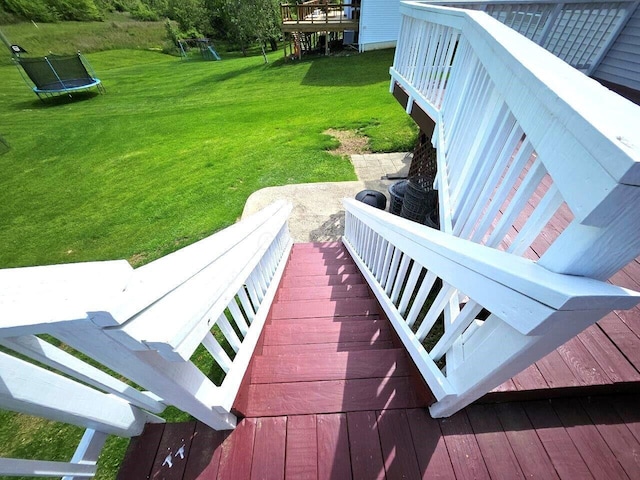 464 Highbanks Valley Dr, Newark, OH 43055 - deck with a trampoline and a lawn