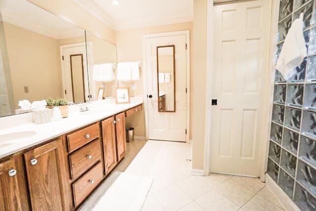 532 Woodview Rd, Westerville, OH 43081 - bathroom with crown molding, double vanity, and tile patterned flooring