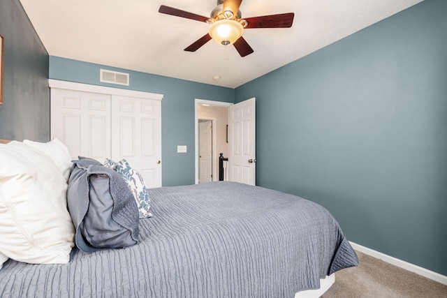 4381 Grathrine Ct, Lewis Center, OH 43035 - carpeted bedroom featuring a closet, baseboards, and a ceiling fan