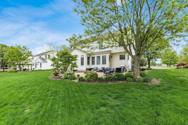 4381 Grathrine Ct, Lewis Center, OH 43035 - rear view of property with a patio area, a yard, and an outdoor hangout area