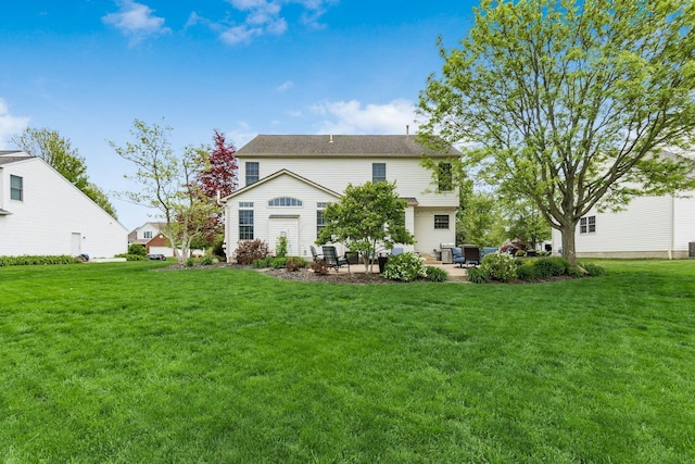 4381 Grathrine Ct, Lewis Center, OH 43035 - rear view of property with a patio and a lawn