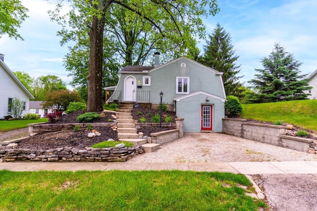 651 Eastern Ave, Bellefontaine, OH 43311 - view of front facade featuring stucco siding