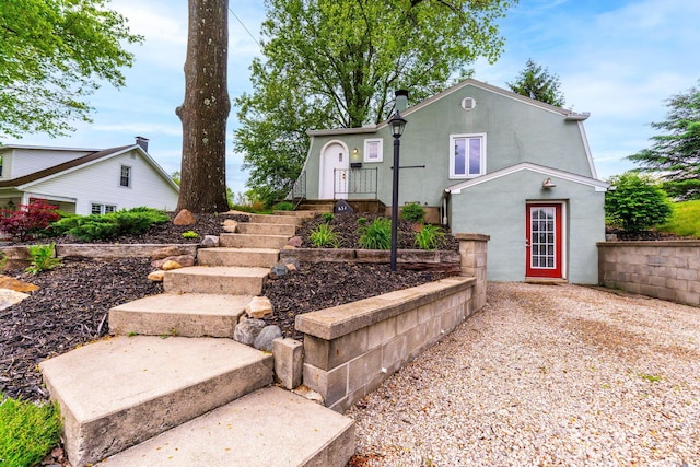 651 Eastern Ave, Bellefontaine, OH 43311 - view of front of house with stucco siding