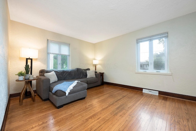 651 Eastern Ave, Bellefontaine, OH 43311 - living room with light wood-type flooring and baseboards