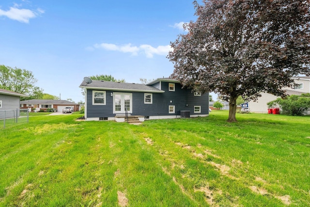 86 Arlington Ave, London, OH 43140 - back of property featuring french doors, central AC, and entry steps
