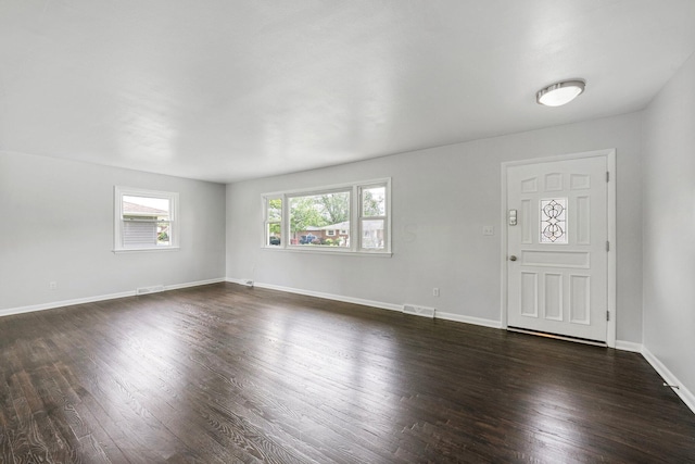 86 Arlington Ave, London, OH 43140 - foyer featuring dark wood-style floors and baseboards