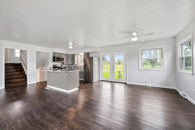 86 Arlington Ave, London, OH 43140 - kitchen featuring stainless steel appliances, gray cabinetry, a center island, and dark wood finished floors