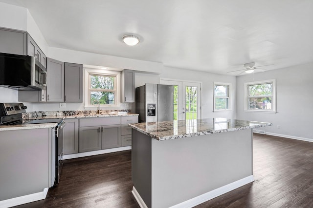 86 Arlington Ave, London, OH 43140 - kitchen featuring stainless steel appliances, gray cabinetry, dark wood-style floors, and a ceiling fan